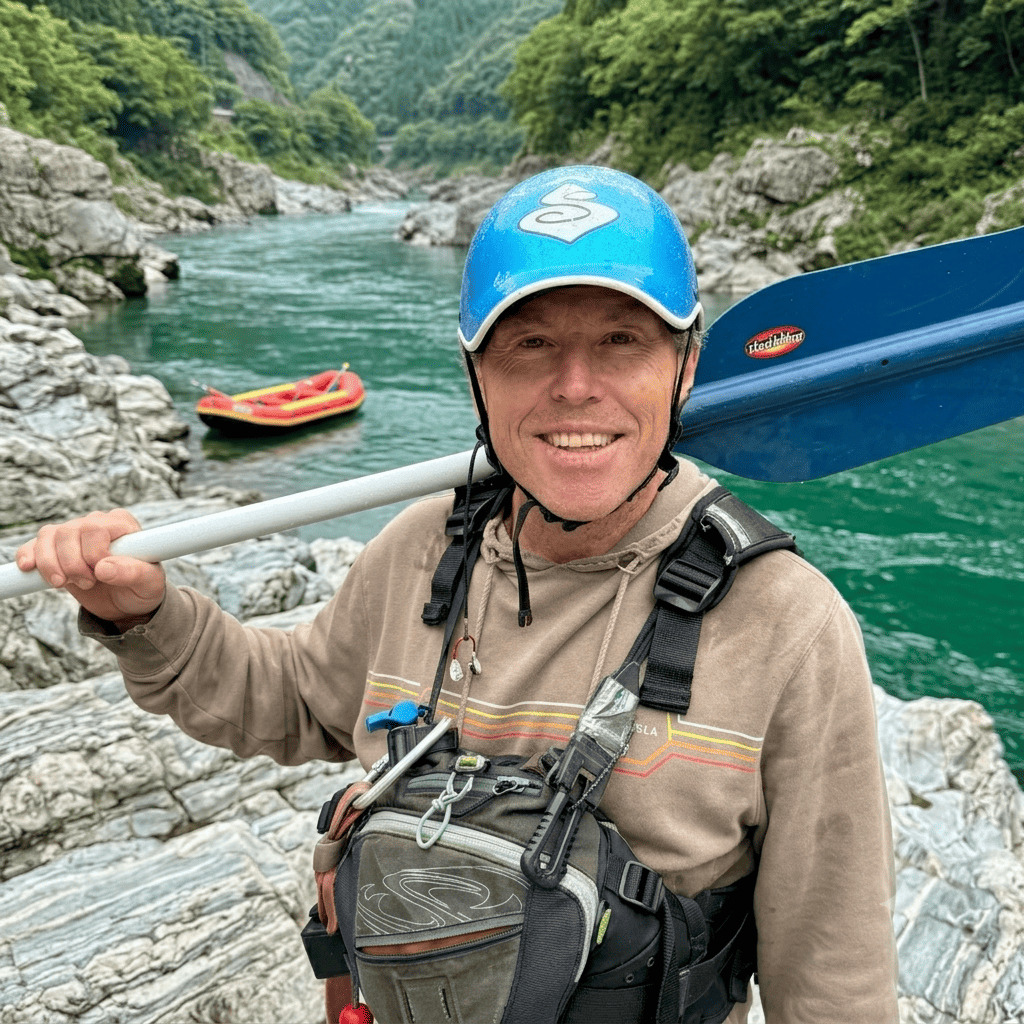 Mark (Hutchie), river guide from New Zealand at Happy Raft rafting company, on the Yoshino River in the Oboke gorge, Japan.