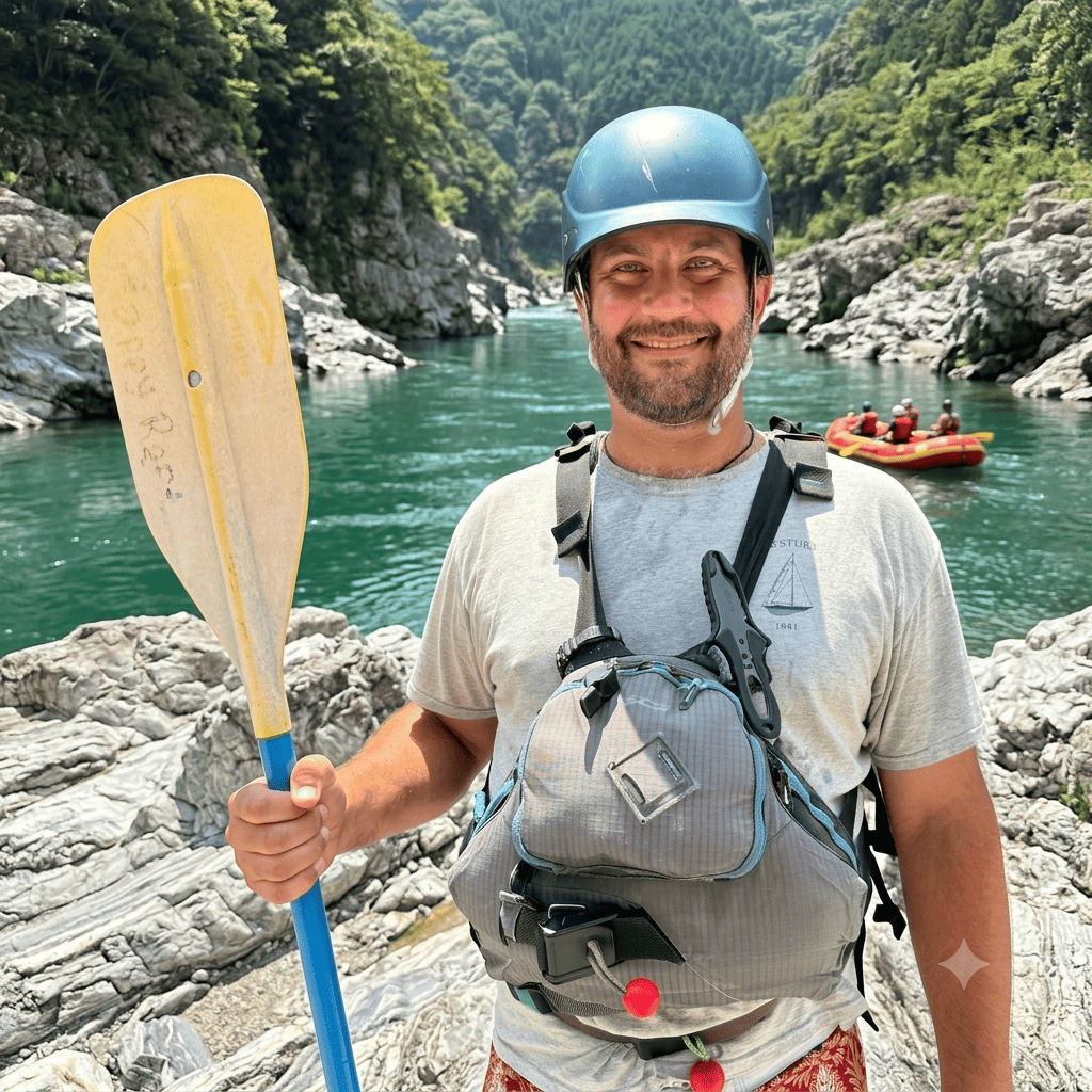 Kirk, river guide from the USA at Happy Raft rafting company, on the Yoshino River in the Oboke gorge, Japan.