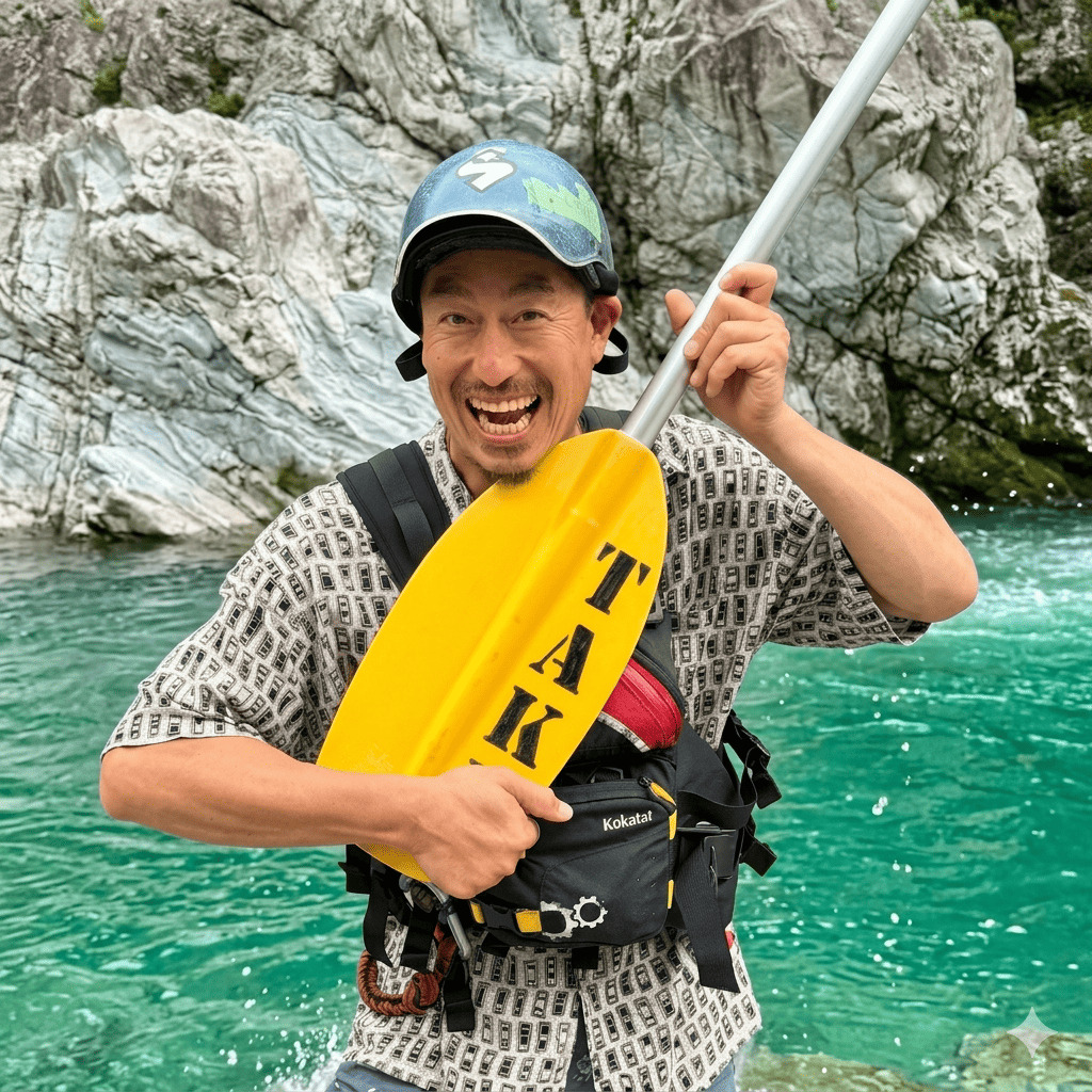 Taka, river guide at Happy Raft rafting company, on the Yoshino River in the Oboke gorge, Japan.